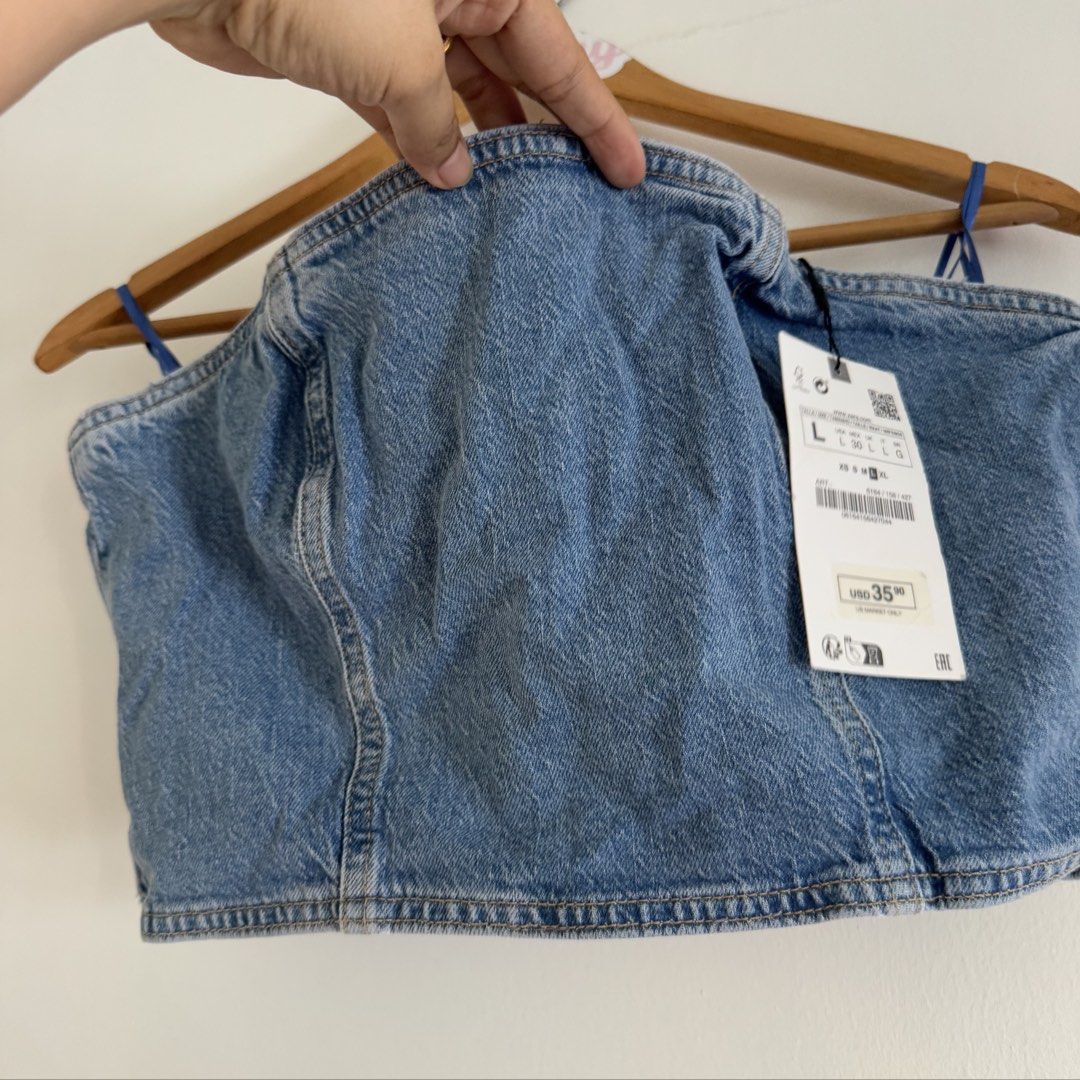 Zara denim top (Category: Sleeveless) located in Manila. Submitted by apparella.ph (Listing ID 1470009584, Image 3). Description: Bnwt Bust:36 Lwngth:10 ☑️Everything is my Own preloved / BNWT/BNWOT ☑️ not thrifted/Ukay ☑️ malukot sa picture kasi na stock sa cabinet (tinatamad mag plantsa ✌️ ) ☑️Personal items ( usually bought in US/UK/JPN ) every year po ako nag aabroad so expect i don’t sell fake items and mejo pricey ☑️ check dimes / ask condit