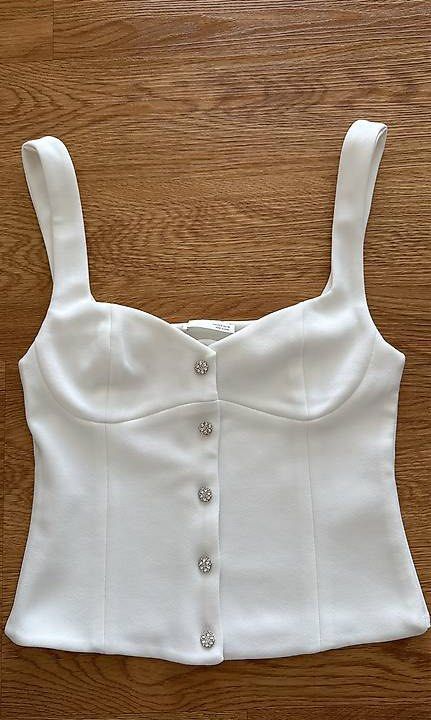 ZARA JEWEL BUTTON CREPE TOP BNWT (Category: Sleeveless) located in Makati City. Submitted by tinycloset__ (Listing ID 1470031247, Image 1). Description: ZARA S ON TAG (SMALLEST SIZE) BNWT.