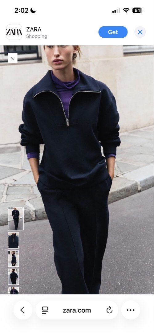 Zara Navy Blue Half Zip Sweatshirt (Category: Coats, Jackets and Outerwear) located in Dasmarinas. Submitted by aoe.ae (Listing ID 1470000159, Image 1). Description: - Brand: Zara - Color: Navy blue - Style: High collar with metal zipper - Fit: Loose, relaxed fit - Details: Long sleeves and ribbed cuffs - Versatility: Easy to throw on for errands, looks great with matching sweatpants.