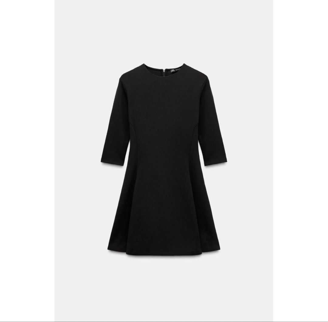 Zara Short Flare Dress Black (Category: Dresses) located in Bacoor. Submitted by shop.ann.g (Listing ID 1470043015, Image 2). Description: - Used once - Style: Short flared dress with a flattering silhouette - Neckline: Classic round neck - Sleeves: Three-quarter length - Closure: Secure back zip - Fabric: Thick, structured, and premium quality - Perfect for: Work, dates, or casual gatherings.
