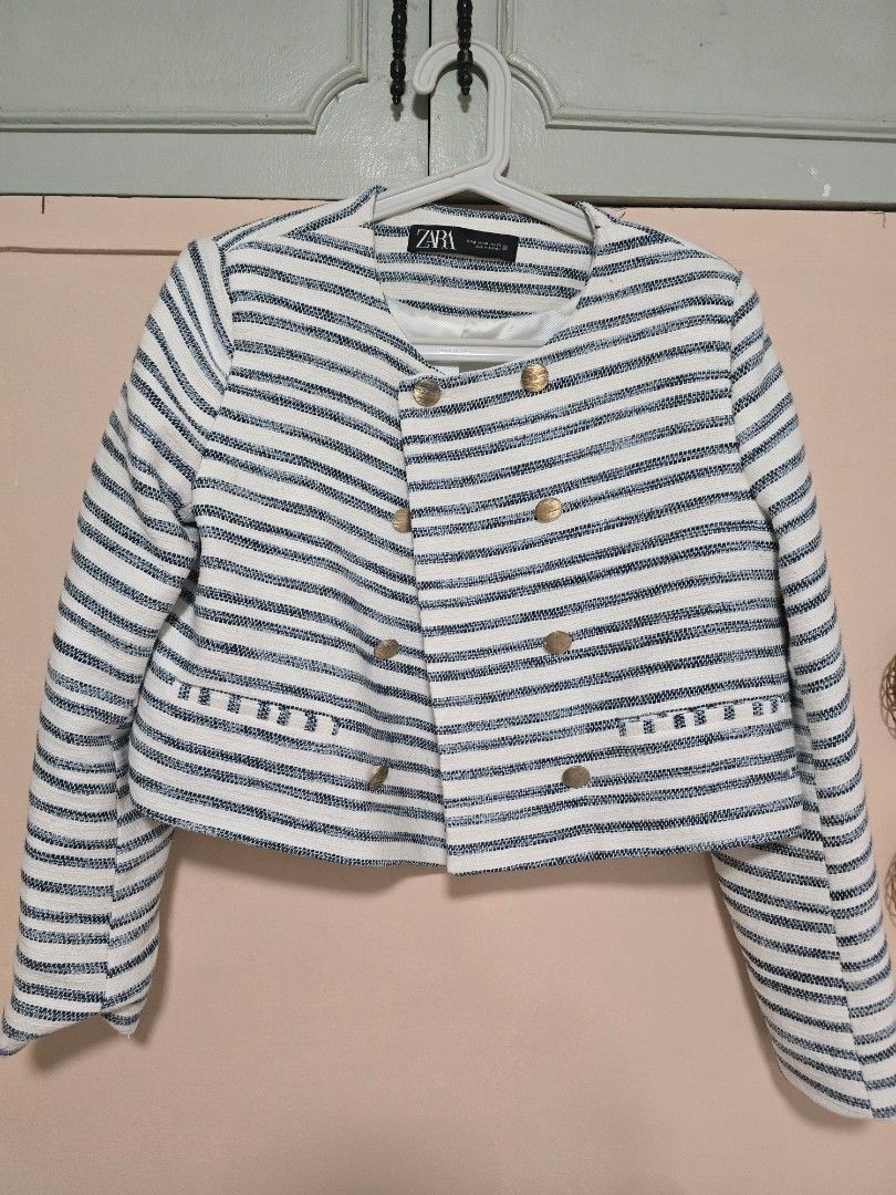 Zara Striped Crop Blazer Size M (Category: Coats, Jackets and Outerwear) located in Paranaque City. Submitted by jasminepc (Listing ID 1469967511, Image 1). Description: last price posted see flaw on last two pictures. can be managed by lint remover and cleaning the button. - Brand: Zara - Size: Medium - Color/Pattern: Blue and white striped - Material: Textured woven fabric with fully lined interior - Details: Gold-tone front buttons, faux pocke