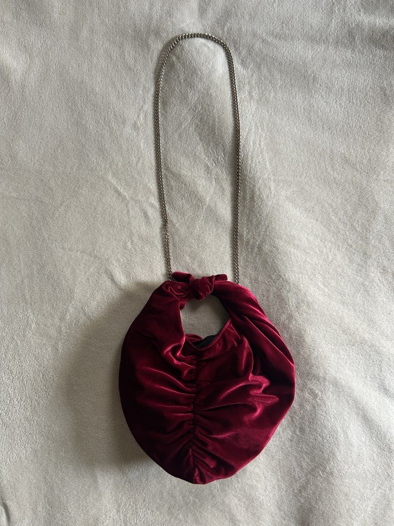 Zara Velvet Knotted Bag (Category: Purses & Pouches) located in Carigara. Submitted by abiesclutter (Listing ID 1469963711, Image 3). Description: Brand: Zara Design: Crossbody bucket bag with velvet exterior and ruched detail. Lined interior. Knotted handle and chain crossbody strap. Magnetic closure. Size: Height x Length x Width: 8.3 x 9.3 x 3.5 inches (21 x 23.5 x 9 cm) Made in: China Condition: Great casual basic sling bag or formal hand bag