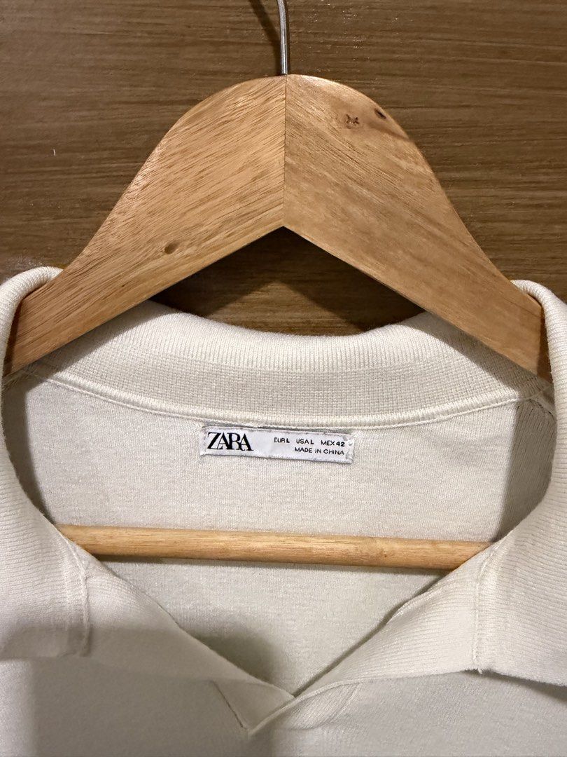 Zara White Knit Polo Sweater (Category: Tshirts & Polo Shirts ) located in Santa Rosa. Submitted by jericobngo (Listing ID 1469951897, Image 2). Description: - Brand: Zara - Item: Knit polo sweater - Color: White - Size: EUR L / USA L / MEX 42 - Details: Long sleeves, collar, open placket neckline, ribbed hem and cuffs - Perfect for: Layering during cooler weather.