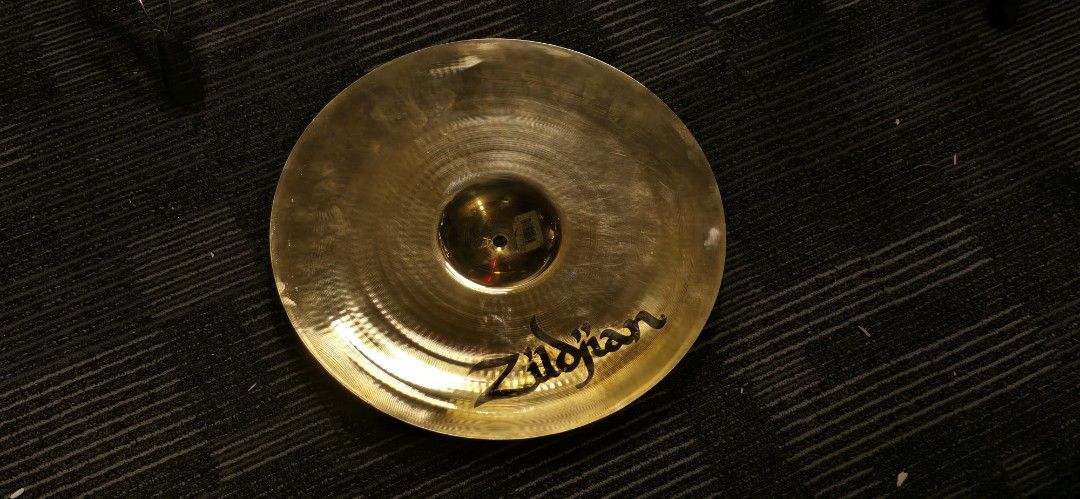 Zildjian A Custom Projection Crash Cymbal 16" (Category: Musical Instruments) located in Paranaque City. Submitted by makitakoyaki2a (Listing ID 1469949024, Image 2). Description: Shimmery, bright, and explosive. Has a quicker response than its larger variants due to having a smaller bell. Medium thin weight with a brilliant finish that shines on stage. Slight logo fade, but no crack or keyholes. Price is negotiable, but please be reasonable. RFS