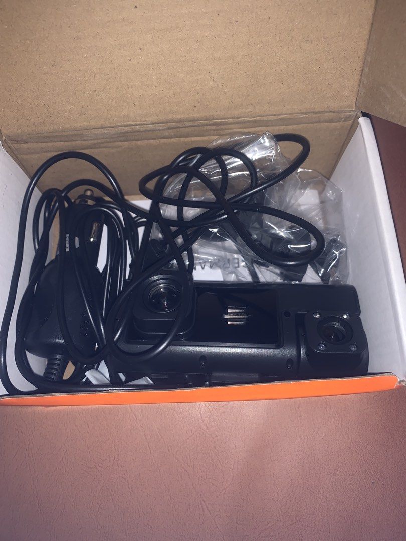 ZKCAMSPY Dash Cam Car Camera System (Category: Cameras) located in Manila. Submitted by zealocean.4c3a50 (Listing ID 1469965301, Image 2). Description: - Brand: ZKCAMSPY - Type: Dual lens dash camera - Color: Black - Condition: Brand new, unused contents in original box - Features: Ideal for drive recording and parking security - Inclusions: Power cable, car charger adapter, and mounting hardware.