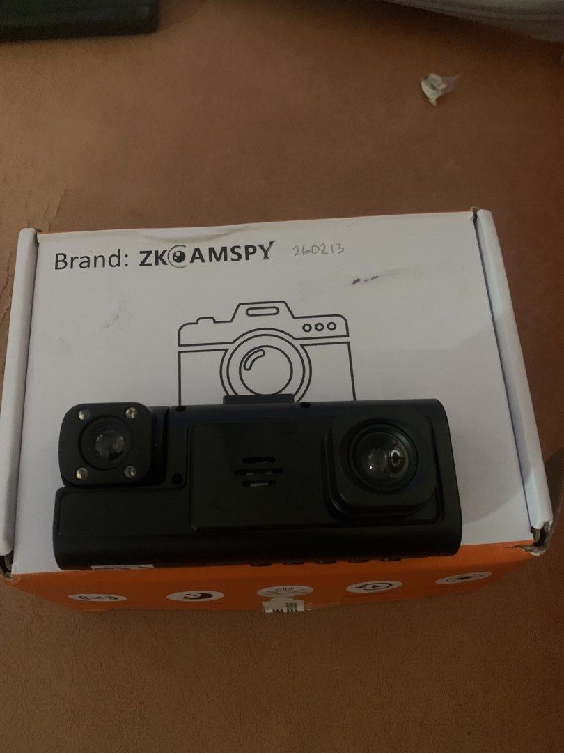 ZKCAMSPY Dash Cam Car Camera System (Category: Cameras) located in Manila. Submitted by zealocean.4c3a50 (Listing ID 1469965301, Image 1). Description: - Brand: ZKCAMSPY - Type: Dual lens dash camera - Color: Black - Condition: Brand new, unused contents in original box - Features: Ideal for drive recording and parking security - Inclusions: Power cable, car charger adapter, and mounting hardware.