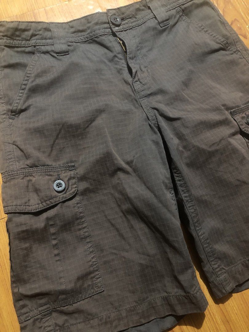 12y Matix Dark Grey Ripstop Cargo Shorts (Category: Babies & Kids Fashion) located in Quezon City. Submitted by lexipotpot (Listing ID 1470275003, Image 2). Description: - Brand/Model: Matix cargo shorts - Color: Dark grey with subtle grid texture - Material: Durable cotton blend - Pockets: Multiple utility pockets including buttoned cargo side pockets and rear flap pockets - Closure: Zipper fly with button closure - With discoloration as seen in