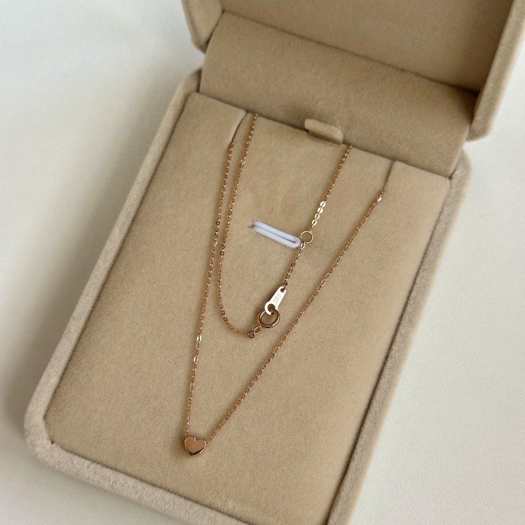 14K Rose Gold 16” & 16.5” Heart Necklace (Category: Necklaces) located in Mandaluyong City. Submitted by lestieco (Listing ID 1470211127, Image 3). Description: • 14k rose gold (pawnable) • Korean item • 16” and 16.5” • Heart necklace with flat cable chain • Heart pendant is movable but not removable • 4mm heart pendant • 16.5-inch adjustable chain with jump ring at 16” allows you to hook the clasp into two distinct lengths (16” or the end ring a