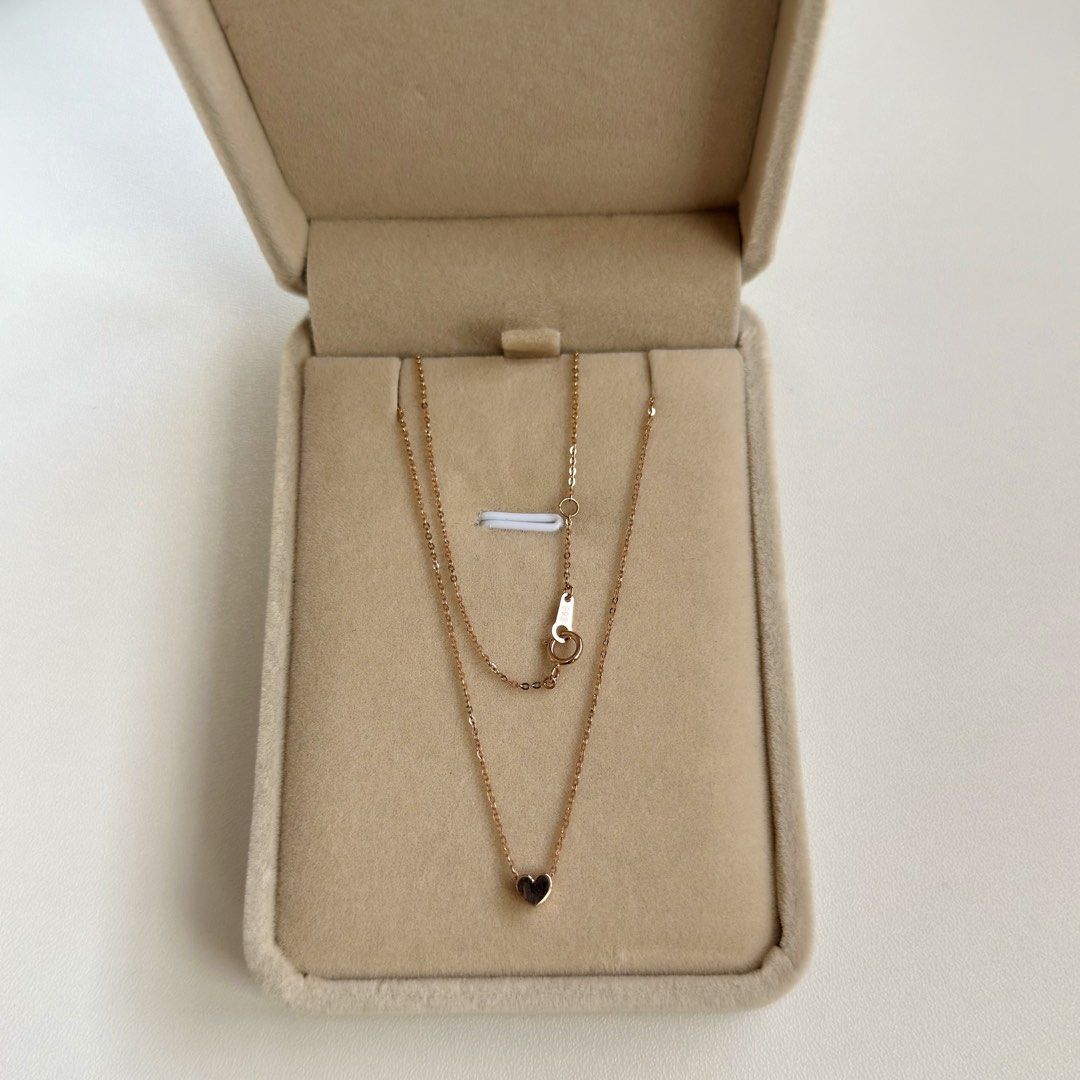 14K Rose Gold 16” & 16.5” Heart Necklace (Category: Necklaces) located in Mandaluyong City. Submitted by lestieco (Listing ID 1470211127, Image 2). Description: • 14k rose gold (pawnable) • Korean item • 16” and 16.5” • Heart necklace with flat cable chain • Heart pendant is movable but not removable • 4mm heart pendant • 16.5-inch adjustable chain with jump ring at 16” allows you to hook the clasp into two distinct lengths (16” or the end ring a