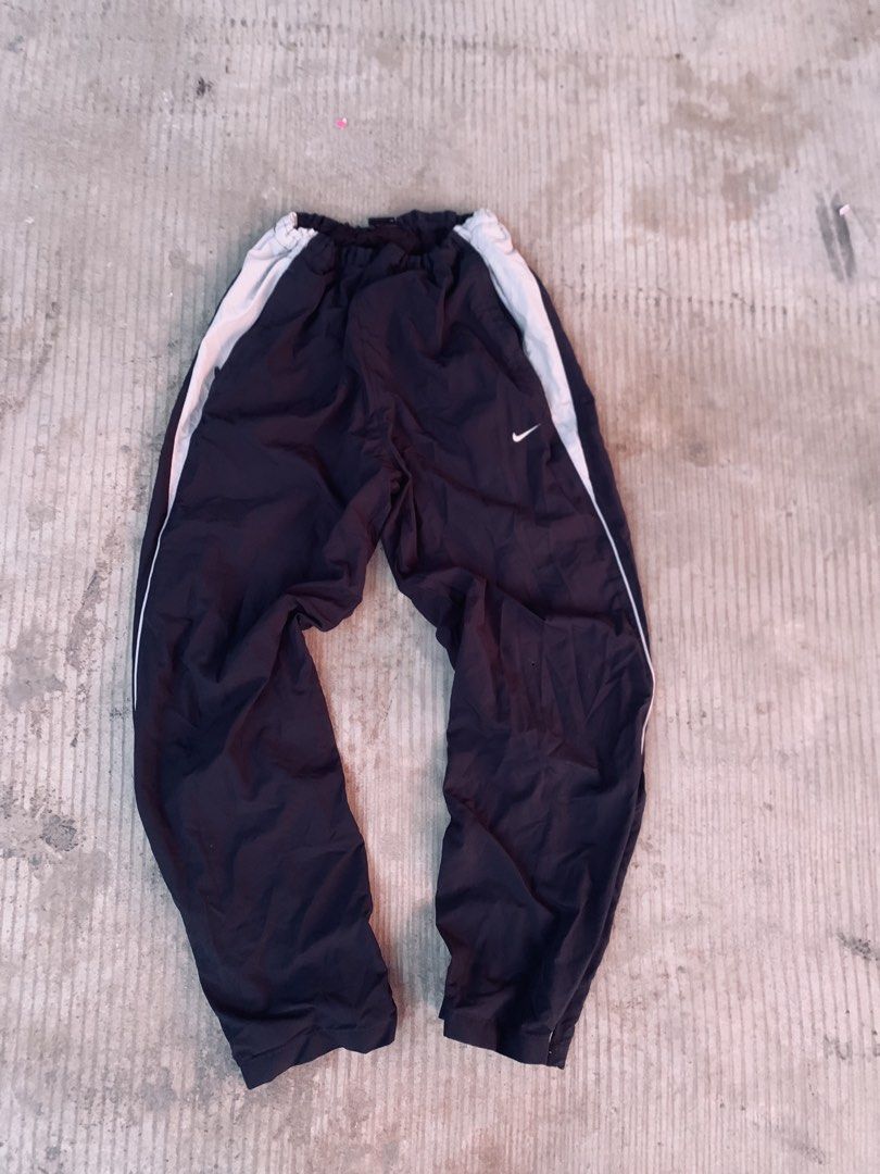 2000’s nike trackpants (Category: Jeans) located in Lipa City. Submitted by inglowetrust (Listing ID 1470264793, Image 1). Description: Garterized waist Adjustable zipper hem 21x41 Excellent condition Issue: 1 small pinhole .