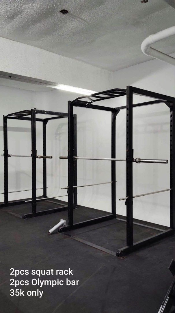2pcs Squat Rack with 2pcs Olympic Bar (Category: Weights & Dumbbells) located in Pasig City. Submitted by rhi-stock (Listing ID 1470198418, Image 1). Description: - Bundle price: ₱35,000 (selling everything together) - Equipment included: 2 heavy-duty black squat racks and 2 Olympic bars - Sturdy steel frame built for heavy lifting and intense workouts - Features built-in pull-up bars on top - Adjustable safety arms and bar catches for security -