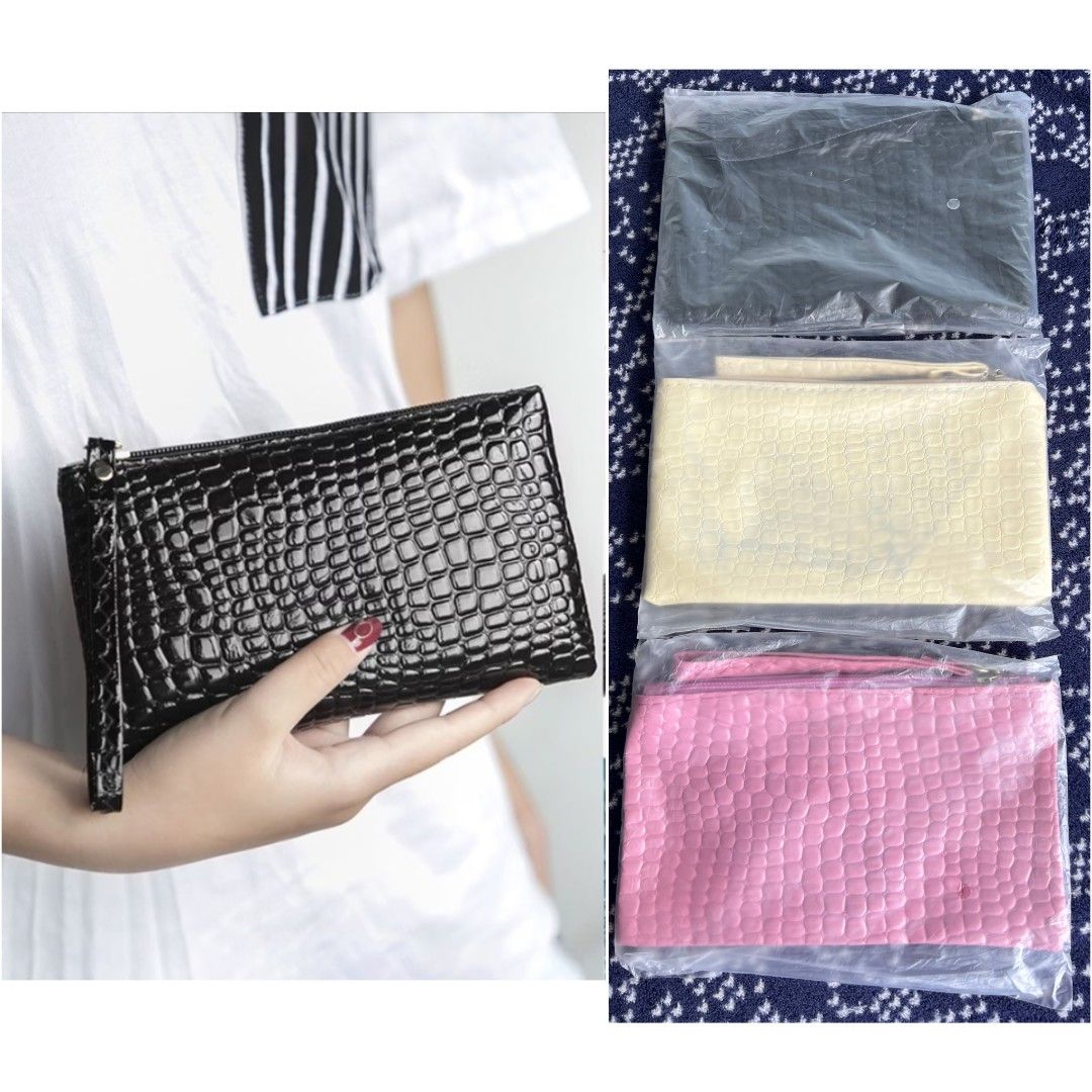 3 PCs Wrislet Bag Purse Pouch bundle (Category: Purses & Pouches) located in Quezon City. Submitted by all_items_50_each (Listing ID 1470186046, Image 1). Description: 3 PCs Wrislet Bag Color: black, pink, beige *may color bleed stains sa beige Measurements posted for reference NEW, not used Bought online (seems like an old stock) 💲ALL ITEMS 50 each 💰MOP: GCash ➕Add shipping fee ❌NO rush shipping, meet up, haggling ✔️for rush, use grab/lalamove