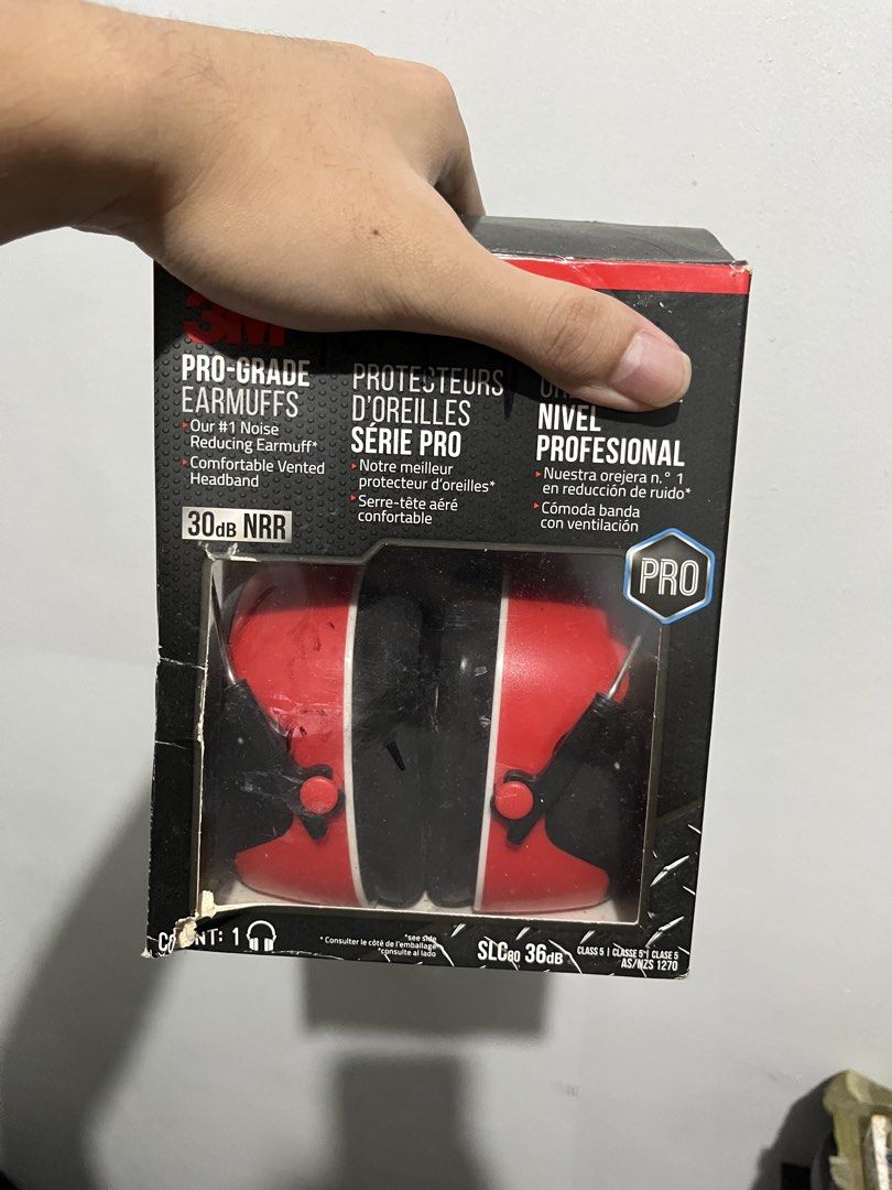 3M Pro-Grade Earmuffs Noise Reducing 30dB NRR (Category: Headphones & Headsets) located in Manila. Submitted by freecat-558be2 (Listing ID 1470254877, Image 3). Description: - Brand: 3M Pro-Grade Noise-Reducing Earmuffs - Color: Red and black - Protection Rating: 30dB NRR / SLC80 36dB - Comfort & Fit: Adjustable vented headband, steel wires with rugged overmold design, premium cushioning, and pivoting cups - Condition: Brand new, unopened inside;