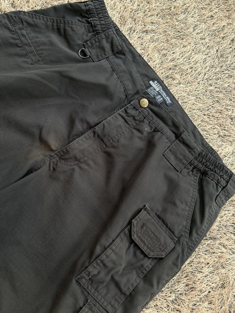 5.11 Tactical Cargo Shorts Black Size 36 (Category: Shorts) located in Digos. Submitted by nasosaaa (Listing ID 1470214698, Image 2). Description: - Brand: 5.11 Tactical - Color: Black - Multiple utility pockets for gear and essentials - Reinforced belt loops for extra durability - Elastic waistband panels on the sides for a comfortable fit - Tough fabric construction built to last - Ideal for outdoor activities, work, or daily wear.