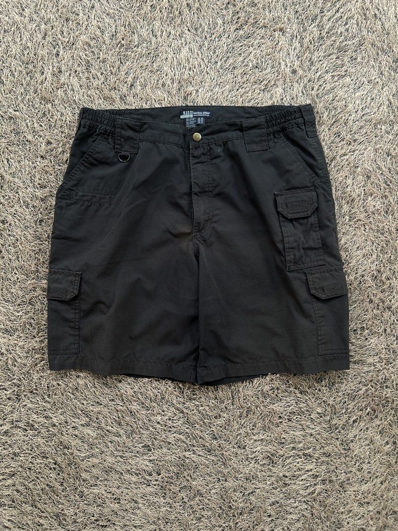 5.11 Tactical Cargo Shorts Black Size 36 (Category: Shorts) located in Digos. Submitted by nasosaaa (Listing ID 1470214698, Image 1). Description: - Brand: 5.11 Tactical - Color: Black - Multiple utility pockets for gear and essentials - Reinforced belt loops for extra durability - Elastic waistband panels on the sides for a comfortable fit - Tough fabric construction built to last - Ideal for outdoor activities, work, or daily wear.
