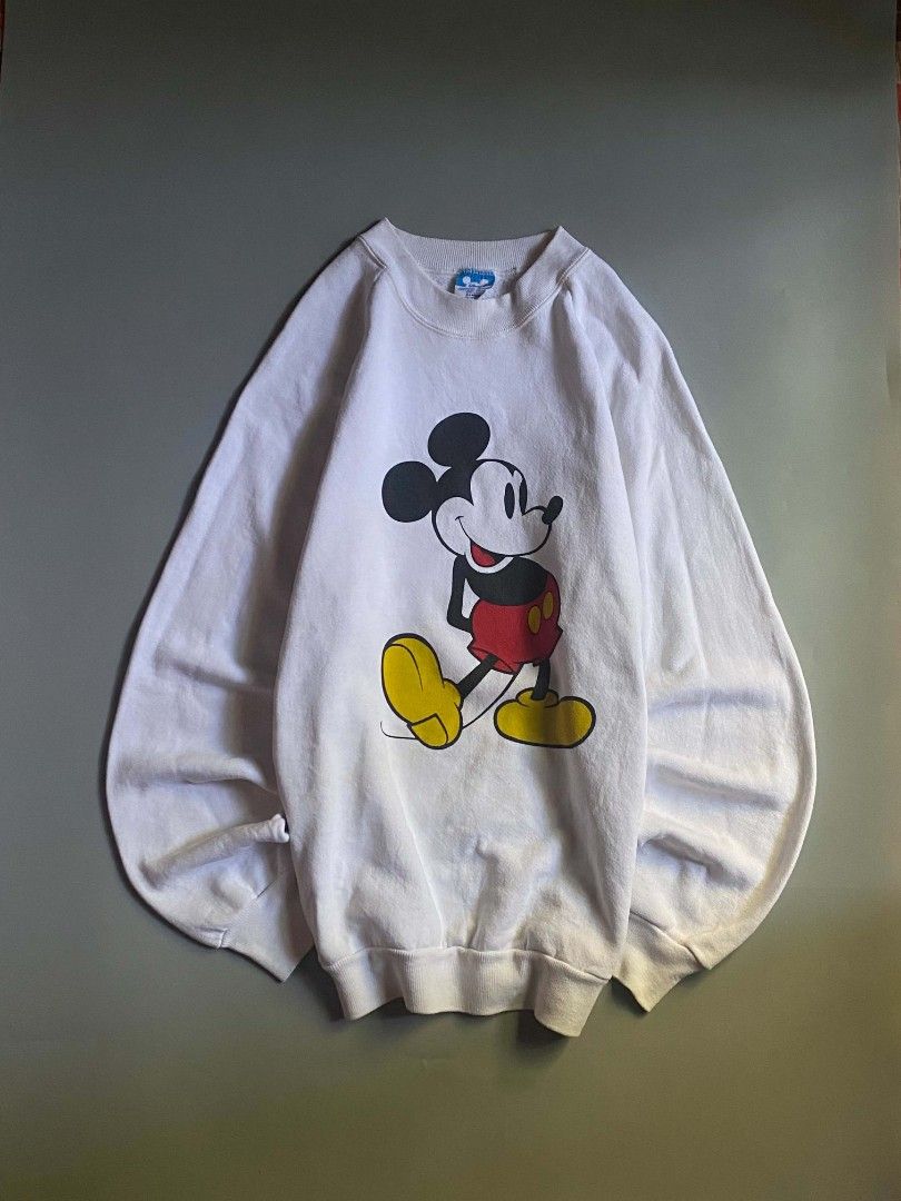80's Mickey Mouse Sweatshirt (Category: Coats, Jackets and Outerwear) located in Angeles City. Submitted by ian.thrift_ph (Listing ID 1470183176, Image 1). Description: W22 L27 Yellow Stain and Lints Sign of usage.