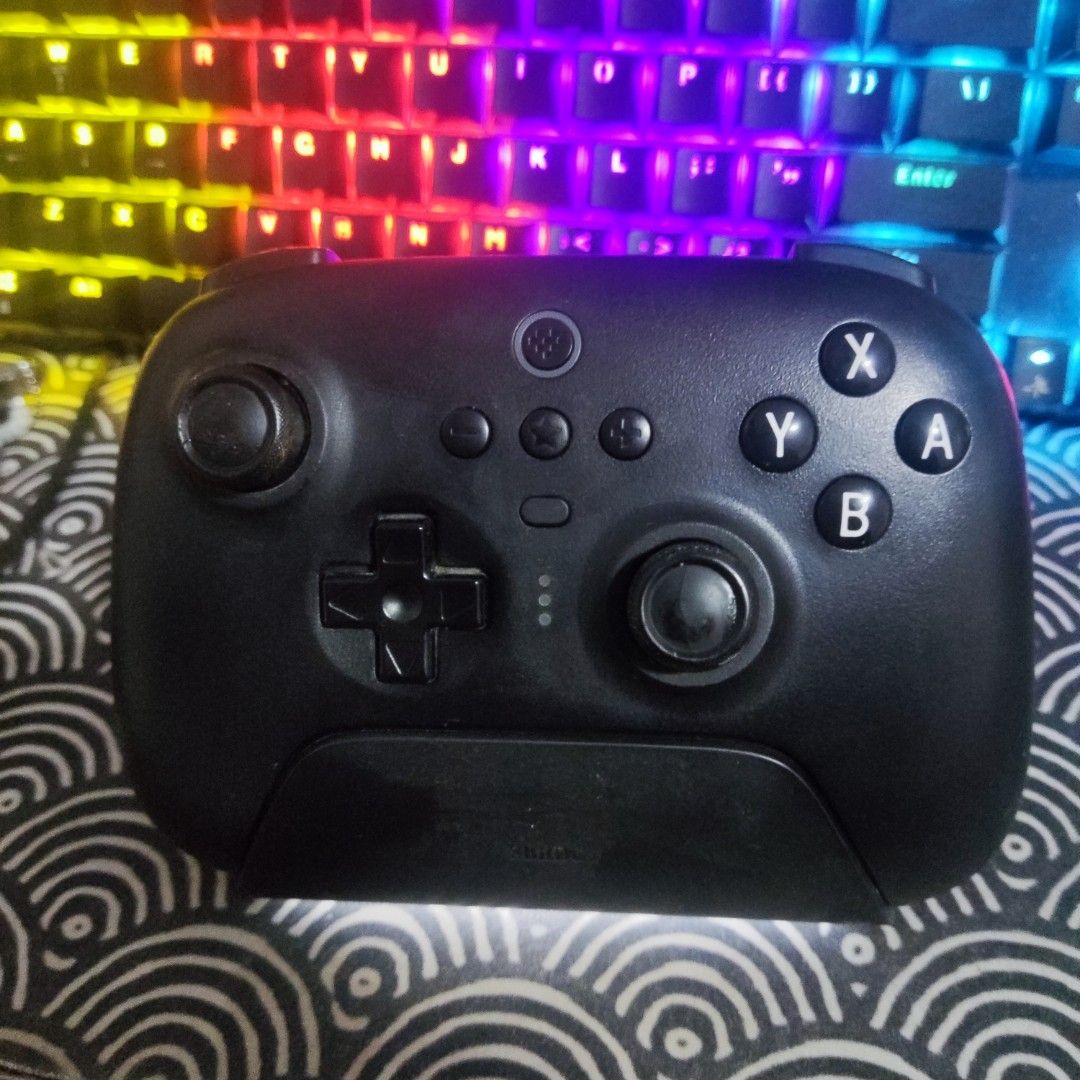8Bitdo Ultimate Bluetooth Controller with Dock (Category: Controllers) located in Rizal. Submitted by jwlnbl (Listing ID 1470286977, Image 1). Description: Issue: Unstable triggers, already configured in 8Bitdo Ultimate Software so it functions well. (I recently played FFXIV and it works well) Included charging dock, type-c charger. No box, but I'll use box from Classic Controller Travel Case box if delivery. Can switch to Dongle & Bluetooth, so 
