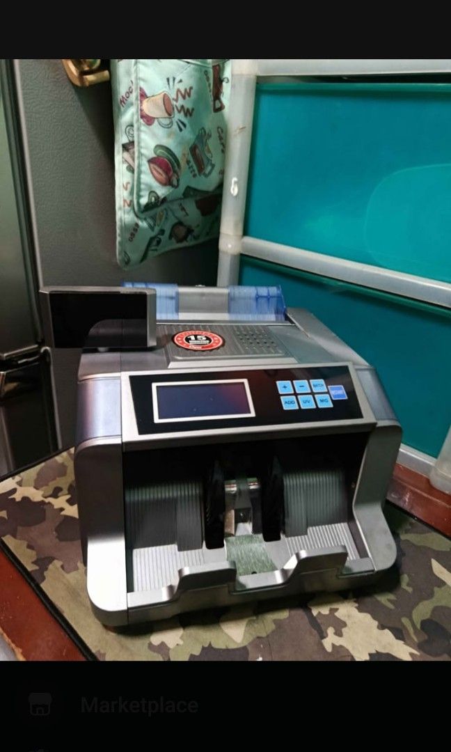 💸 MONEY COUNTING MACHINE 💸 (Category: Office & Business Technology) located in Manila. Submitted by mjfinds.ph (Listing ID 1470339669, Image 1). Description: 💸 FOR SALE: MONEY COUNTING MACHINE 💸 💰 PRICE: ₱2,200 ONLY! 🏷️ Brand: DenAku ✨ Great for small businesses, shops, sari-sari stores, and offices. ✅ Convenient and time-saving ✅ Helps count bills faster 📍 Location: Pasay City 🚚 Shipping / delivery arrangements available 💬 Message us fo