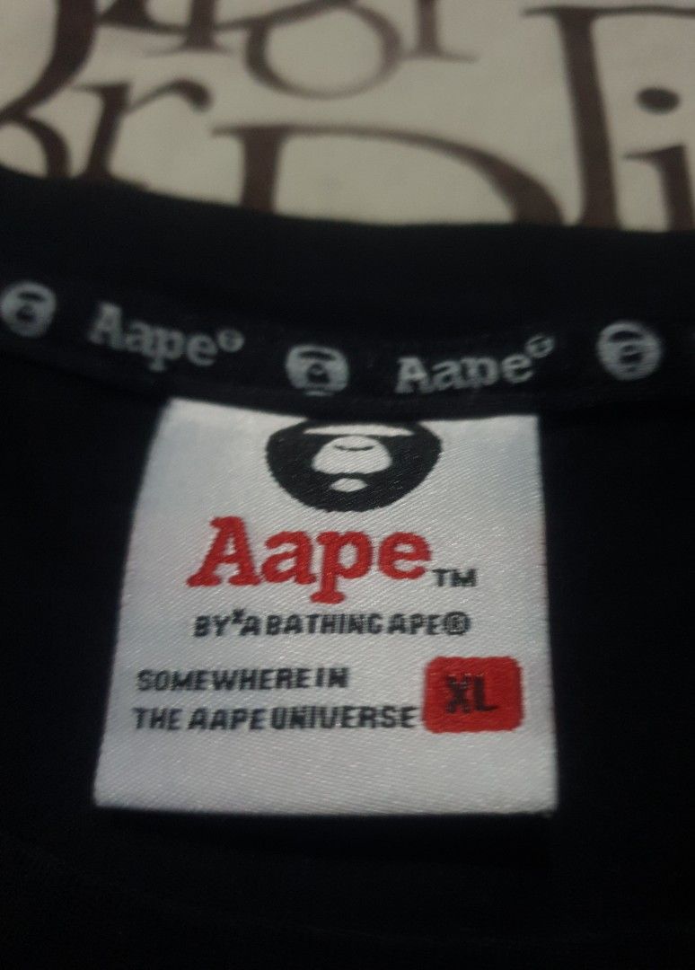 Aape by A Bathing ape (Category: Tshirts & Polo Shirts ) located in San Fernando. Submitted by retro.district. (Listing ID 1470346909, Image 3). Description: - Aape by A Bathing Ape - Size: XL youth(19x26) - Condition: Excellent - No issue - Color Rate: 9.5/10.