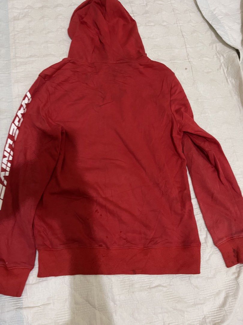 AAPE By A Bathing Ape Red Zip-Up Hoodie (Category: Babies & Kids Fashion) located in Caloocan City. Submitted by noblecat_c04f74 (Listing ID 1470153302, Image 2). Description: - Brand: AAPE by A Bathing Ape - Color: Bright red - Design: Large white ape logo on chest and 'AAPE Universe' text on sleeve - Features: Full zip-up closure, front pocket with woven brand tag, ribbed cuffs and hem - Condition: Stains (See Picture) Red color is not faded an