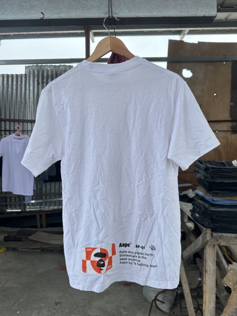 Aape by abathing ape camauflage graphic Tee (Category: Tshirts & Polo Shirts ) located in Davao. Submitted by boss_kel (Listing ID 1470146874, Image 2). Description: No crack prints, Solido pa cut washtag pang tas need malabhan may mga minimal stain na sure naman na matatanggal, Maliliit lang rin.