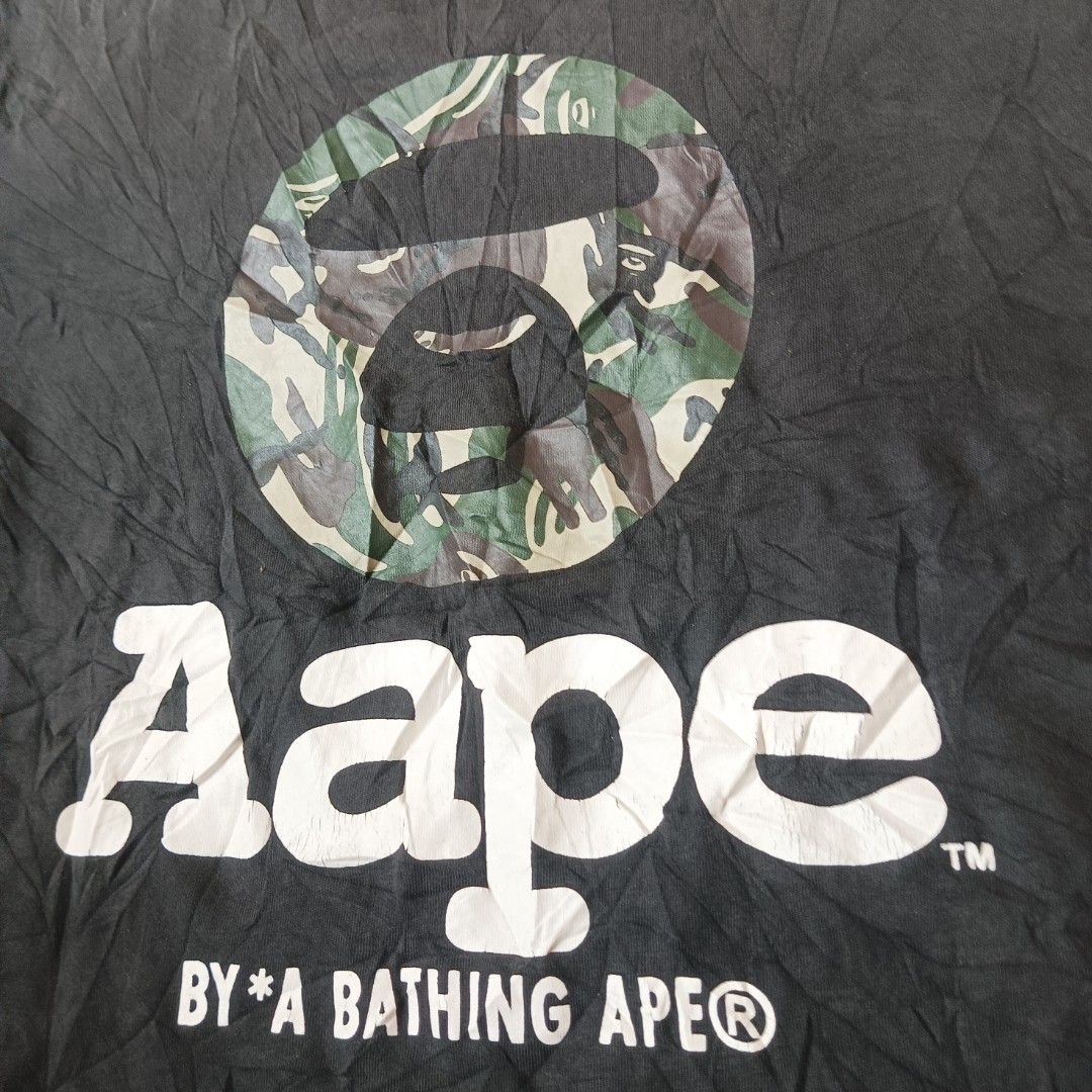 AAPE CAMO BLACK TEE by *A BATHING APE (Category: Tshirts & Polo Shirts ) located in Cagayan de Oro. Submitted by kennthought (Listing ID 1470220970, Image 2). Description: AAPE CAMO BLACK TEE by *A BATHING APE ‎xl on tag ‎length "27 ‎width "20 ‎-color may vary due to bad cam ‎-off/legit ‎-this item is thrifted, pm for more details..