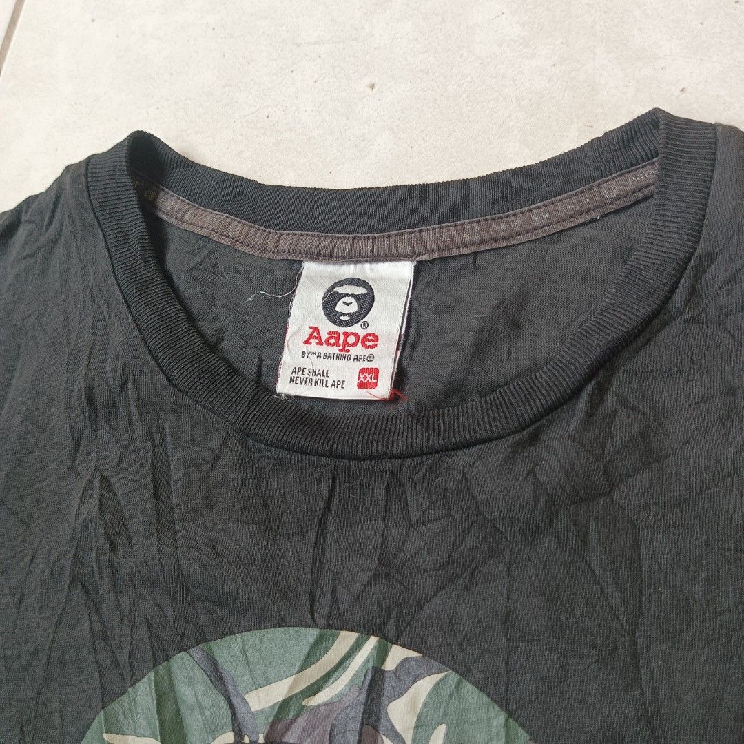 AAPE CAMO BLACK TEE by *A BATHING APE (Category: Tshirts & Polo Shirts ) located in Cagayan de Oro. Submitted by kennthought (Listing ID 1470220970, Image 3). Description: AAPE CAMO BLACK TEE by *A BATHING APE ‎xl on tag ‎length "27 ‎width "20 ‎-color may vary due to bad cam ‎-off/legit ‎-this item is thrifted, pm for more details..