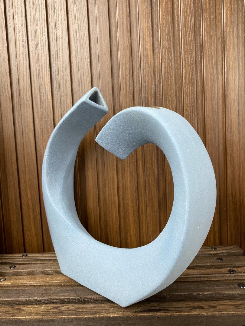 Abstract Loop Vase (Category: Vases & Decorative Bowls) located in Pasay City. Submitted by thepickypicker (Listing ID 1470177462, Image 2). Description: Abstract Loop P980 Size: 8 3/4 tall, 9 5/8 wide *has stains at the opening .