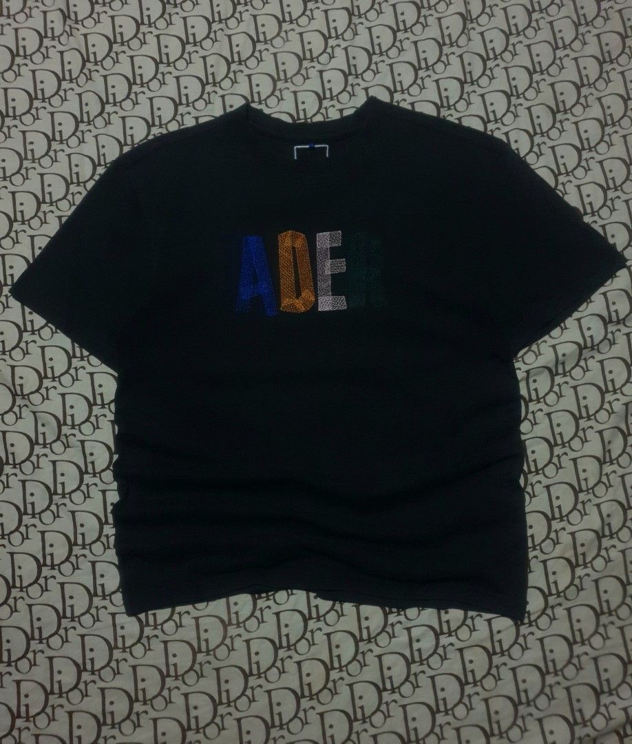 Ader error embroided spellout (Category: Tshirts & Polo Shirts ) located in San Fernando. Submitted by retro.district. (Listing ID 1470345686, Image 1). Description: - Ader error embroided spellout - Size: Large(22x28) - Condition: Excellent - No issue - Color Rate: 8.5/10.