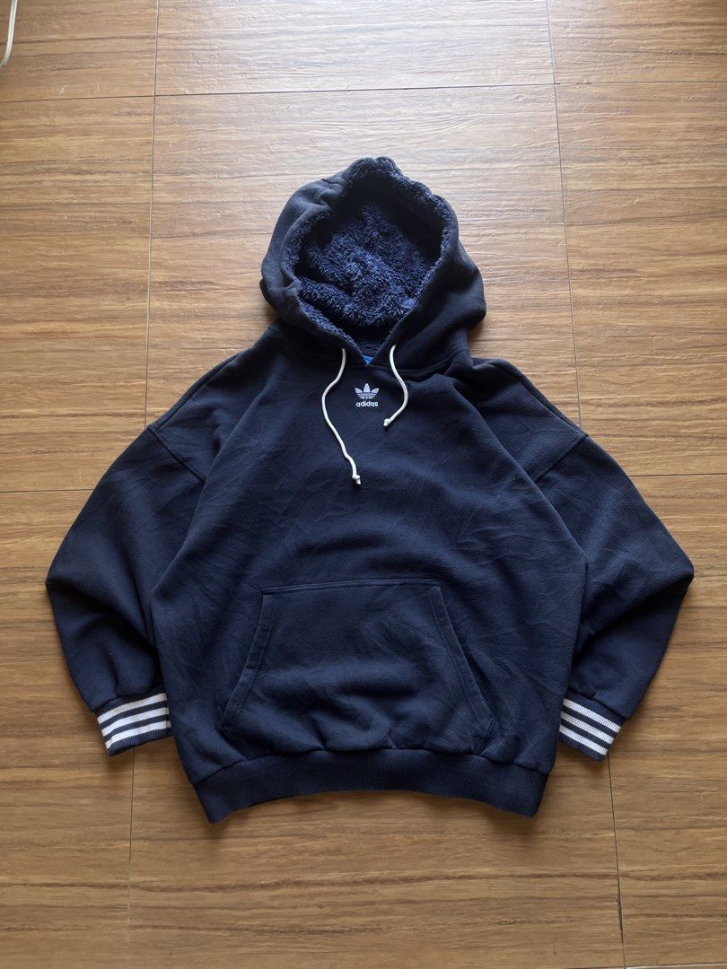 Adidas Big Spell Out Sherpa Lined Pullover Hoodie (Category: Coats, Jackets and Outerwear) located in Davao. Submitted by spilled.bins (Listing ID 1470269388, Image 2). Description: Adidas Big Spell Out Sherpa Lined Pullover Hoodie 2017 Release Width: 24.5in Length: 25in Boxy XL Measurement | Best Fit Large Used Fade | Lints Good Condition . Mine: ₱800 +shipping fee on top . Model Reference: Height: 5’5 feet Weight: 68kg.