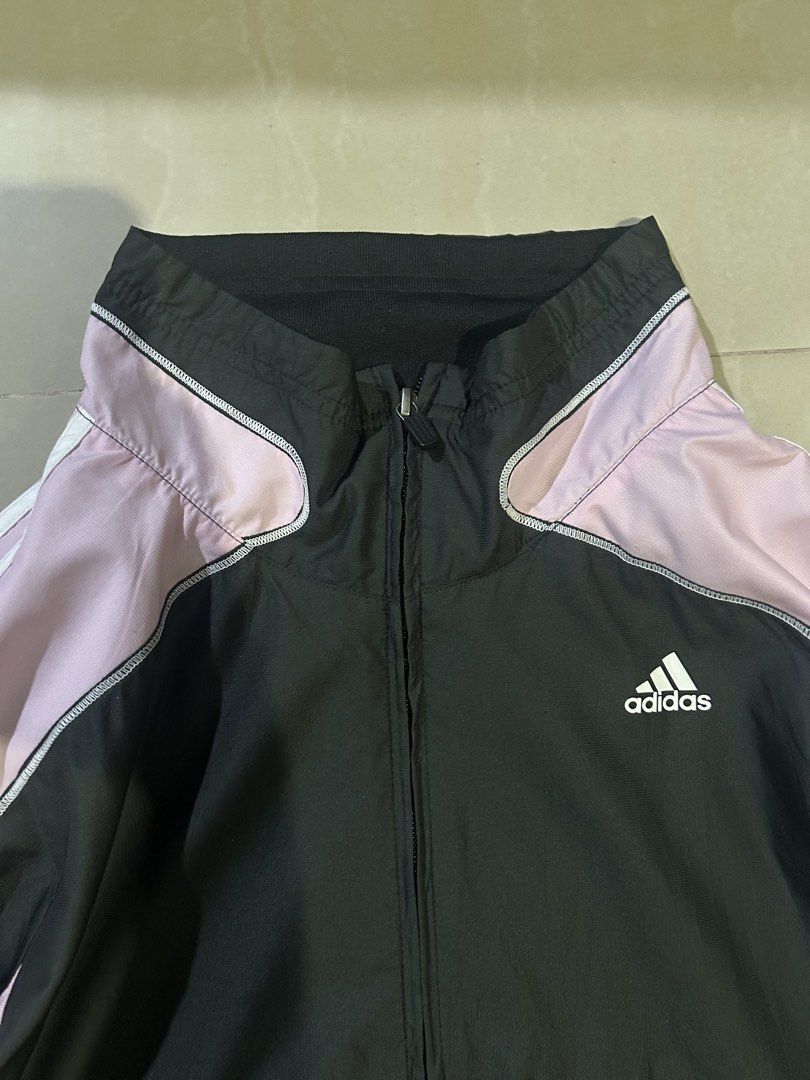 Adidas Black and Pink Full-Zip Track Jacket (Category: Coats, Jackets and Outerwear) located in San Fernando. Submitted by thrift_lang_ni_kim (Listing ID 1470322443, Image 2). Description: ⬇️ DETAILS ⬇️ Adidas Black and Pink Full-Zip Track Jacket DIMENSIONS (INCHES) Width:21.5 Length:26 Best fit: M to L (short fit) Color rate:9/10 Condition/Issue: Good condi/minimal lints Mine: ₱400 Minimum increment: ₱50 Already washed and ready to wear. 📌 Plea