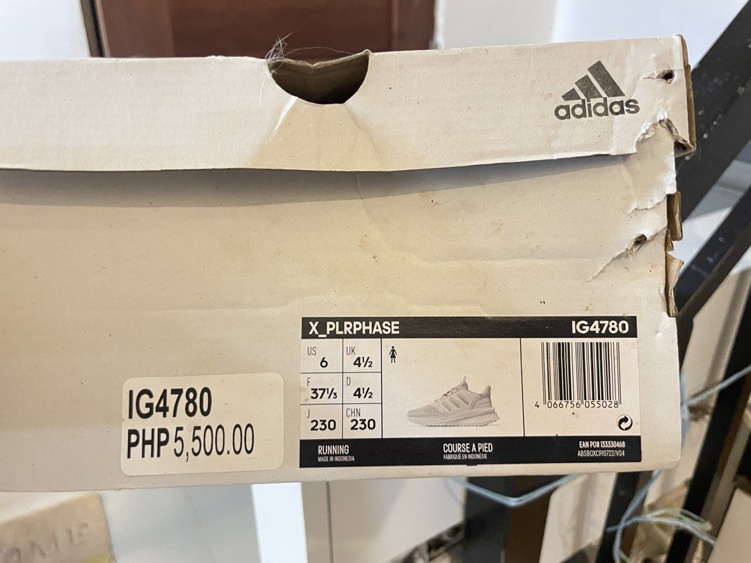 Adidas Boost White Running Shoes (Category: Sneakers) located in Los Banos. Submitted by reinabee88 (Listing ID 1470234610, Image 2). Description: - Brand: Adidas Boost - Color: Classic White - Material: Breathable mesh upper with chunky sole and iconic three-stripe branding - Condition: Used / Pre-loved, no tears/holes, just noticeable yellowing on the midsoles and minor scuff marks on the uppers and heels - Used less than 10 times, sole is inta