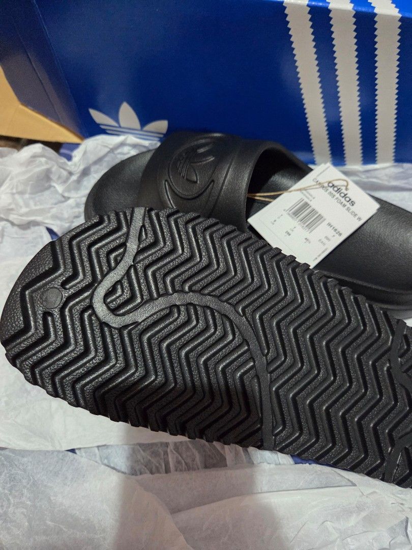 Adidas Campus 00s Foam Slide W Core Black (Category: Slippers & Slides) located in Abucay. Submitted by stripesandcheck (Listing ID 1470250036, Image 3). Description: FIXED PRICE Adidas Campus 00s Foam Slides - Color: Core Black - Size: Women's US 8 / UK 7 / 255mm - Design: Slip-on with molded trefoil logo branding - Comfort & Grip: Textured footbed and thick zig-zag outsole - Condition: Brand new with attached tag and original box included.