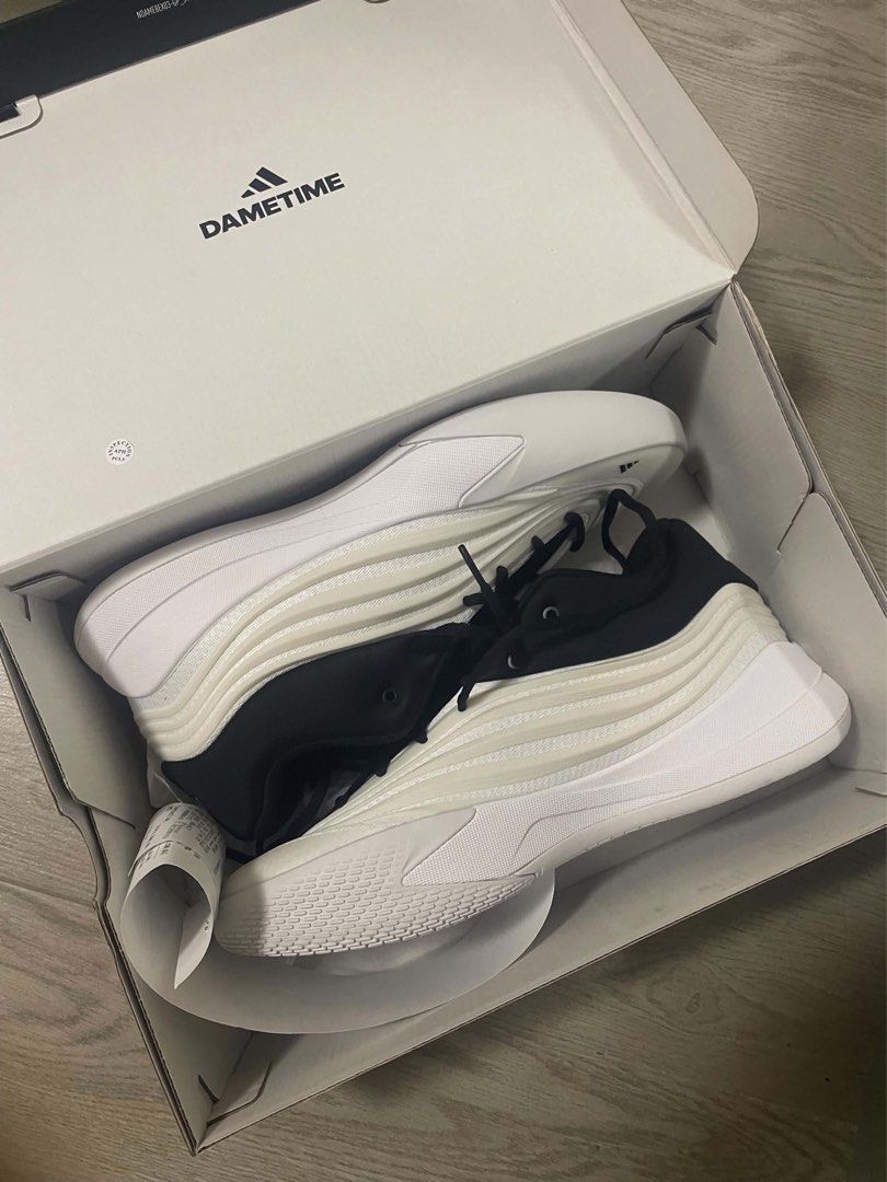 Adidas Dame X (Category: Sneakers) located in Angeles City. Submitted by lukemafinds (Listing ID 1470274659, Image 1). Description: - Brand: Adidas Dame X - Colorway: Black and white - Condition: Brand new, never worn (Fresh out of the box) - Features: Clean design with distinctive wavy side panels - Inclusions: Comes with original box and paper stuffing - Best for: Solid hoop shoes or stylish daily kicks -original -bnew -Size 11 -Bagong bago pa 