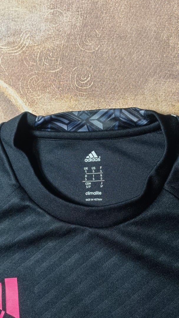 Adidas Predator Climalite Long Sleeve Training Top (Category: Activewear) located in Cavite. Submitted by navias (Listing ID 1470245249, Image 2). Description: - Brand: Adidas Predator - Color: Black with pink logo and white stripes - Size: Small (on tag) - Material: Climalite fabric to keep you dry and comfortable - Features: Geometric pattern on collar, cuffs, and hem, plus a small 'predator' graphic near the hem - Condition: Great piece for so