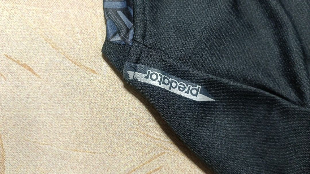 Adidas Predator Climalite Long Sleeve Training Top (Category: Activewear) located in Cavite. Submitted by navias (Listing ID 1470245249, Image 3). Description: - Brand: Adidas Predator - Color: Black with pink logo and white stripes - Size: Small (on tag) - Material: Climalite fabric to keep you dry and comfortable - Features: Geometric pattern on collar, cuffs, and hem, plus a small 'predator' graphic near the hem - Condition: Great piece for so