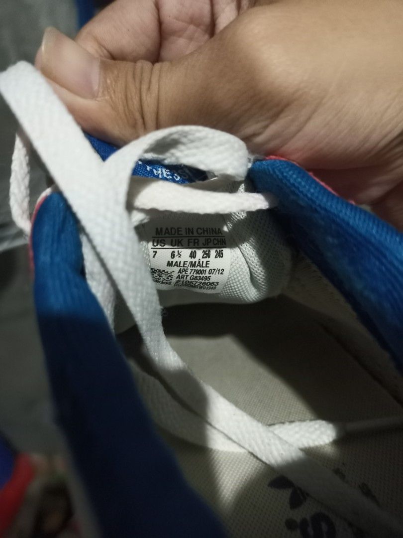 Adidas Retro Red Blue Sneakers Size US 7 (Category: Sneakers) located in Mabalacat. Submitted by hasashoe (Listing ID 1470282485, Image 3). Description: - Brand: Adidas - Style: Retro low-top runner sneakers - Color: Red, white, and blue - Size: US 7 / UK 6.5 / EU 40 - Materials: Suede and fabric upper with black rubber ripple soles for solid grip - Inclusions: Comes with white laces - Condition/Use: Comfortable style, perfect for everyday wear.