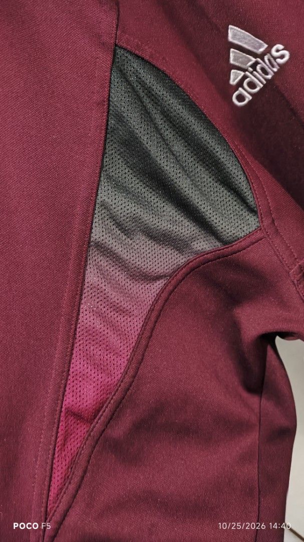 Adidas Watterson Maroon Track Jacket (Category: Coats, Jackets and Outerwear) located in Quezon City. Submitted by ralphralph (Listing ID 1470247153, Image 3). Description: - Color: Maroon with black panels and white piping - Brand: Authentic Adidas track jacket with full zip - Details: Embroidered Adidas logo and Watterson eagle team crest - Comfort: Mesh ventilation inserts on upper sleeves, ribbed cuffs and hem - Storage: Convenient side pocke