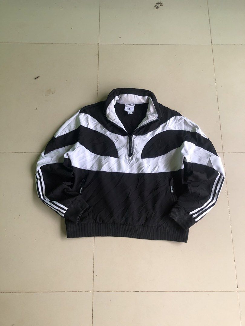 Adidas x Palace Half Zip Track Jacket (Category: Coats, Jackets and Outerwear) located in Cagayan de Oro. Submitted by leklekthrift (Listing ID 1470259472, Image 1). Description: - Brand: Adidas x Palace - Style: Half-zip track jacket in black and white colourblock - Details: High collar with large PALACE branding on the back, custom Palace zip pull - Accents: Classic three stripes on sleeves, dual side zip pockets - Sizing: UK/US Size S (D/F/E/I