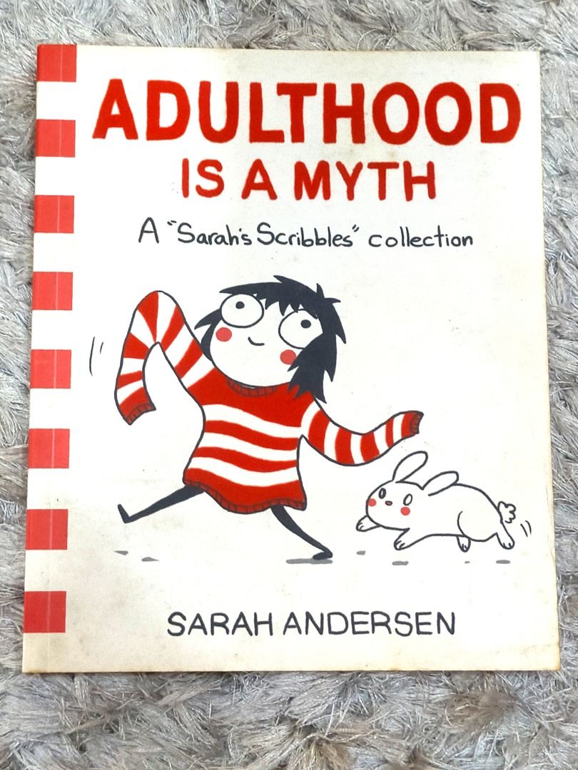 Adulthood Is a Myth | A Sarah's Scribbles Collection Book (Category: Storybooks) located in Paranaque City. Submitted by _cherrycheesecake_goodies_ (Listing ID 1470177366, Image 1). Description: *If you like or don't mind classic quirk chungus humor. I've had this book by Sarah Andersen for years. ★Format: Paperback edition ★Genre: Slice of life, Comedy ★Condition: Well used | Slight creases on cover and discoloration, Clean pages with no damage 