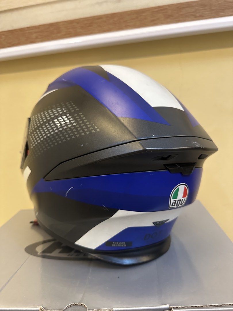 AGV Full Face Motorcycle Helmet Blue White Black (Category: Caps & Hats) located in Cavite. Submitted by andre.29 (Listing ID 1470227068, Image 3). Description: - Brand: AGV Full Face Helmet - Design: Stylish black, blue, and white graphics - Visors: Smooth clear visor installed + handy drop-down sun visor - Safety: Certified with ECE 2205 and DOT ratings on the back shell - Closure: Standard secure chin strap - Condition: Solid build quality wit