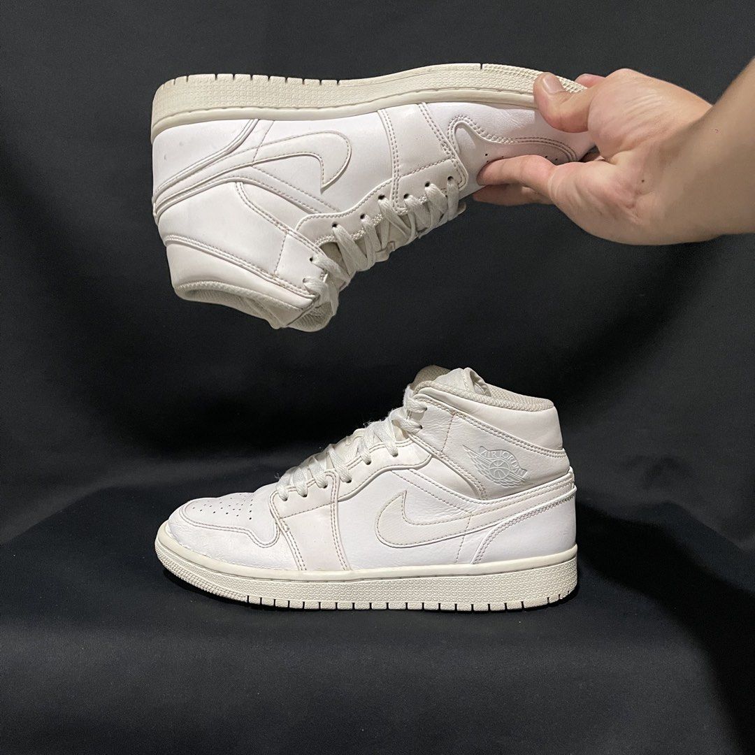 Air Jordan 1 Mid Triple White US 7.5 (Category: Sneakers) located in Bulacan. Submitted by ogieeee (Listing ID 1470230897, Image 3). Description: - Brand/Model: Nike Air Jordan 1 Mid - Colorway: Triple White - Size: US 7.5 / EUR 40.5 / CM 25.5 - Material: Premium leather upper - Condition: Normal signs of wear on soles and light creases on toe box - Features: Classic mid-top silhouette, versatile everyday shoe - Authenticity: Size tag located ins