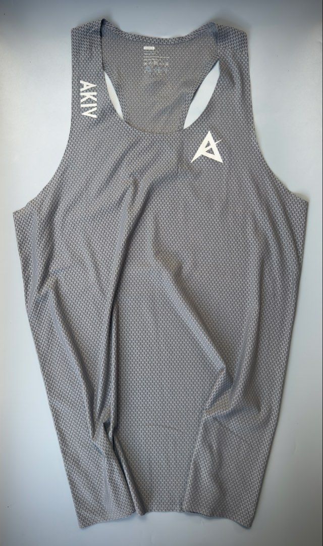 AKIV RACING ELITE SINGLET (Category: Activewear) located in Legazpi City. Submitted by mr.solelution (Listing ID 1470220678, Image 1). Description: • AKIV RACING ELITE SINGLET ( men ) • LARGE on TAG • DIMES: W - 18 | L - 28 • EXCELLENT CONDITION • NO ISSUE LOCATION: LEGAZPI ALBAY BICOL 📍 PLUS SHIPPING FEE 💵.