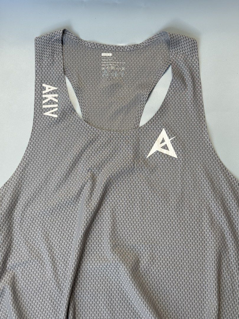 AKIV RACING ELITE SINGLET (Category: Activewear) located in Legazpi City. Submitted by mr.solelution (Listing ID 1470220678, Image 2). Description: • AKIV RACING ELITE SINGLET ( men ) • LARGE on TAG • DIMES: W - 18 | L - 28 • EXCELLENT CONDITION • NO ISSUE LOCATION: LEGAZPI ALBAY BICOL 📍 PLUS SHIPPING FEE 💵.