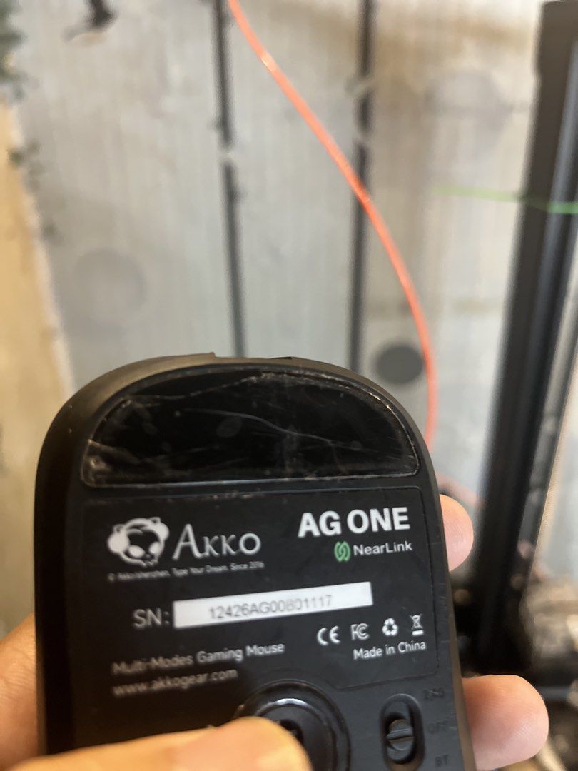 Akko AG One NearLink Multi-Modes Gaming Mouse (Category: Mouse & Mousepads) located in Quezon City. Submitted by alyxxz (Listing ID 1470145737, Image 3). Description: - Model: Akko AG One Gaming Mouse (Matte Black) - Connectivity: Multi-mode (2.4G wireless & Bluetooth) - Inclusions: USB receiver and magnetic puck - Condition: Sensor and switches work perfectly; clean matte body - Note: Scuffs and scratches on bottom glide feet from normal desk us