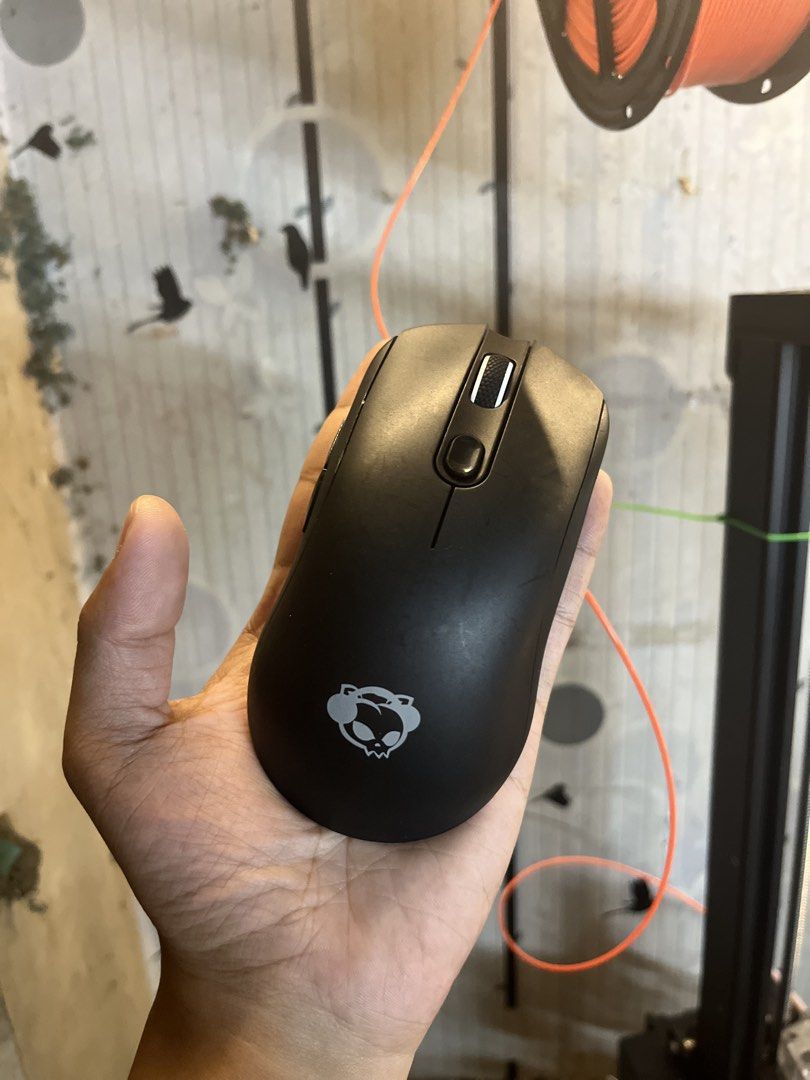 Akko AG One NearLink Multi-Modes Gaming Mouse (Category: Mouse & Mousepads) located in Quezon City. Submitted by alyxxz (Listing ID 1470145737, Image 1). Description: - Model: Akko AG One Gaming Mouse (Matte Black) - Connectivity: Multi-mode (2.4G wireless & Bluetooth) - Inclusions: USB receiver and magnetic puck - Condition: Sensor and switches work perfectly; clean matte body - Note: Scuffs and scratches on bottom glide feet from normal desk us