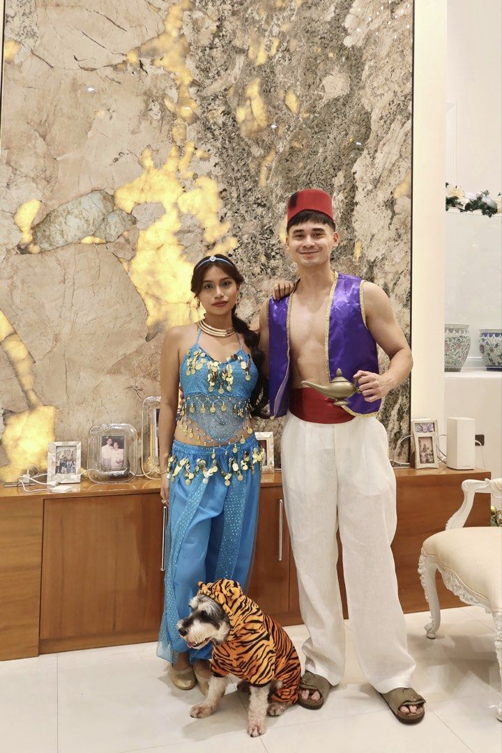 Aladdin & Jasmine Costume (Category: Sets or Coordinates) located in Quezon City. Submitted by carmiizzle (Listing ID 1470176330, Image 1). Description: Aladdin: Vest, hat & lamp included Jasmine: Wig, headband, top & pants, necklace. (No earrings included.).