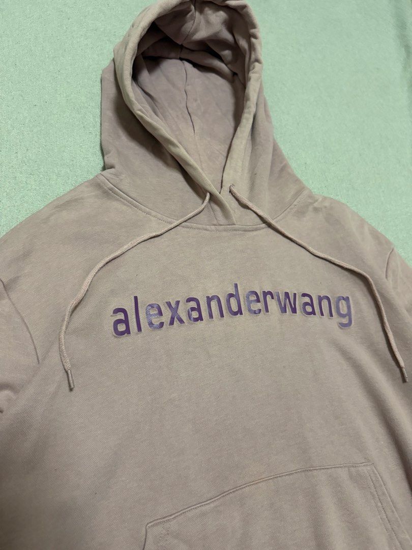 Alexanderwang Embossed Logo Hoodie Jacket (Category: Hoodies) located in Bulacan. Submitted by sanjisthrift (Listing ID 1470303640, Image 2). Description: Size Medium Width 21.5 Length 25.5 Good Condition 9/10 Slightly fade.