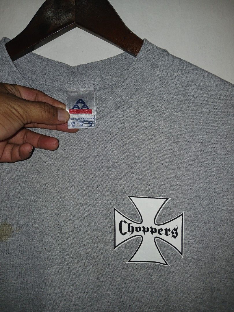 Alstyle Apparel Choppers Graphic T-Shirt Gray Medium (Category: Tshirts & Polo Shirts ) located in Manila. Submitted by ninshok (Listing ID 1470279021, Image 2). Description: - Brand/Model: Alstyle Apparel gray graphic tee - Size: Medium (M) - Design: Choppers cross logo on chest; large eagle, motorcycle engine, and 'Legends Never Die Guam, U.S.A.' graphic on back - Material/Origin: Made in El Salvador of U.S. fabric - Condition: Pre-loved with a