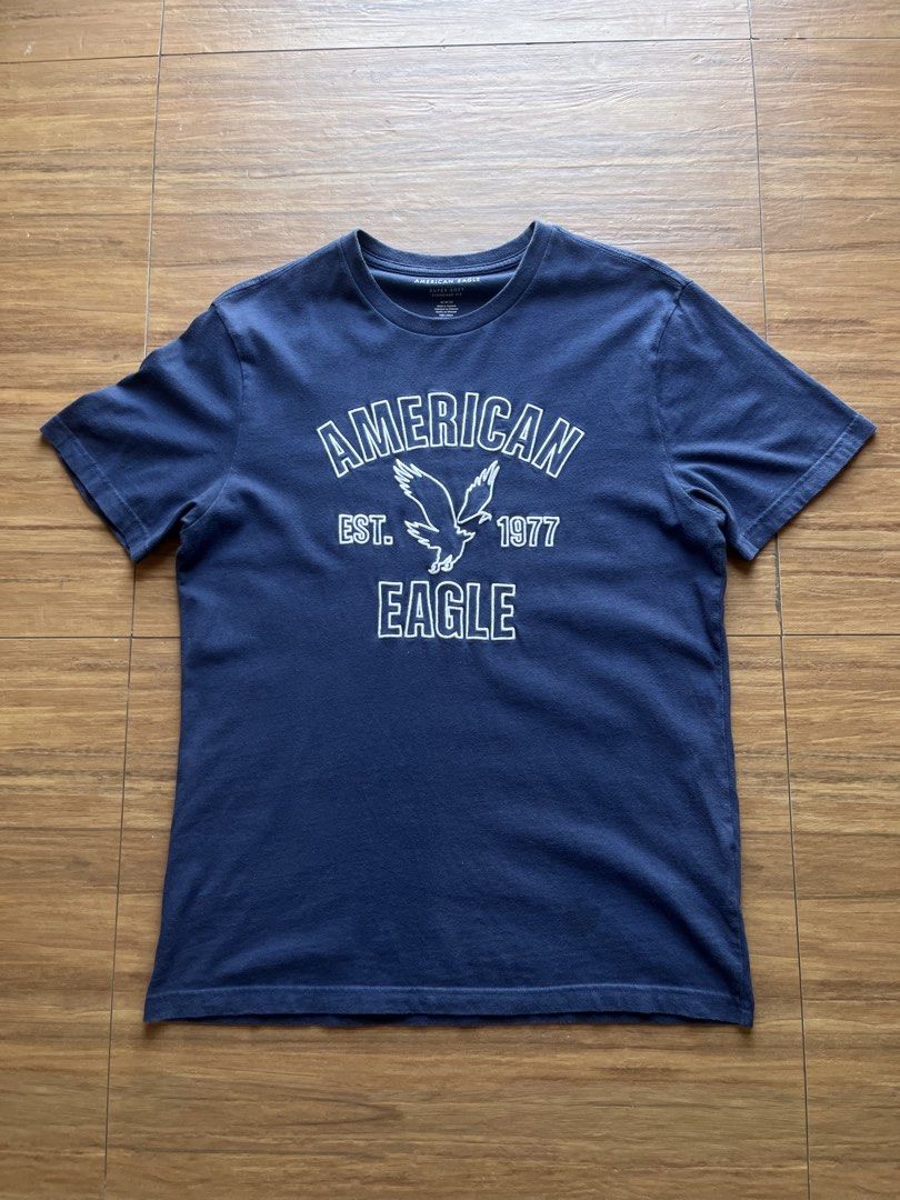 American Eagle College Tee (Category: Tshirts & Polo Shirts ) located in Davao. Submitted by spilled.bins (Listing ID 1470272718, Image 1). Description: American Eagle College Tee Super Soft | Standard Fit Width: 21in Length: 29in Large Measurement | Medium on Tag Stain Excellent Condition . Mine: ₱400 +shipping fee on top . Model Reference: Height: 5’5 feet Weight: 68kg.